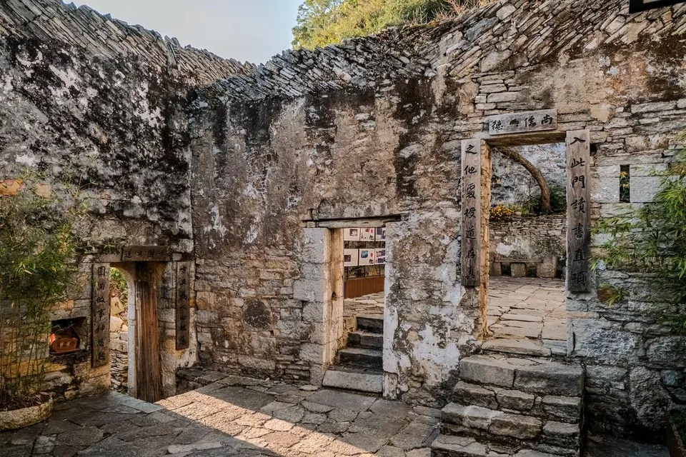 Private guide exploring ancient stone villages traditional architecture