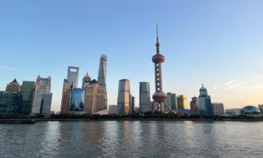 Private guide exploring Shanghai futuristic skyline and smart city technology