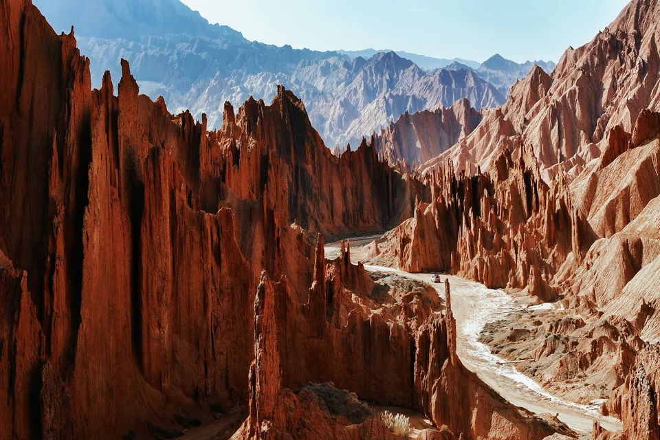 Kuqa Red Canyon dramatic rock formations and desert landscape in Xinjiang