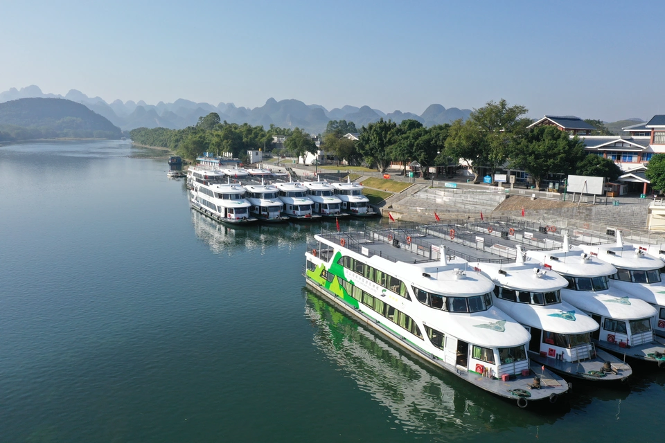 Private tour experience of Li River cruise with scenic karst mountains and river views