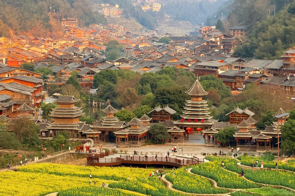 Private tour exploration of Zhaoxing Dong Village with wooden houses and local culture
