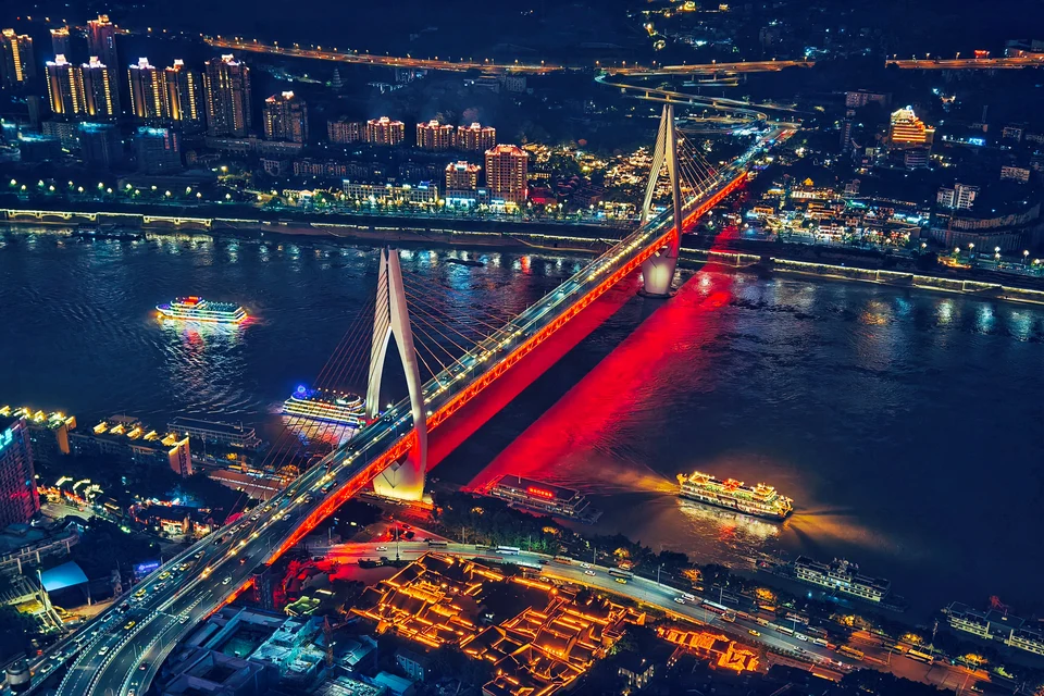 Private tour view of Chongqing’s iconic 8D mountain city with layered buildings, bridges, and dramatic urban landscape