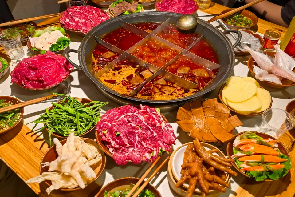 Private tour dining experience with authentic Chongqing hot pot and local cuisine