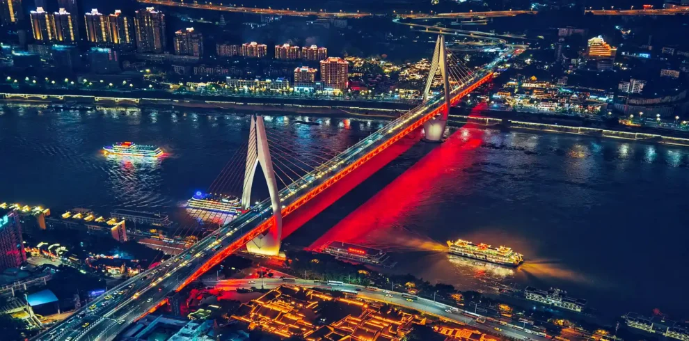 Private tour hero image of Chongqing night skyline with Hongyadong, rivers, bridges, and layered mountain city buildings
