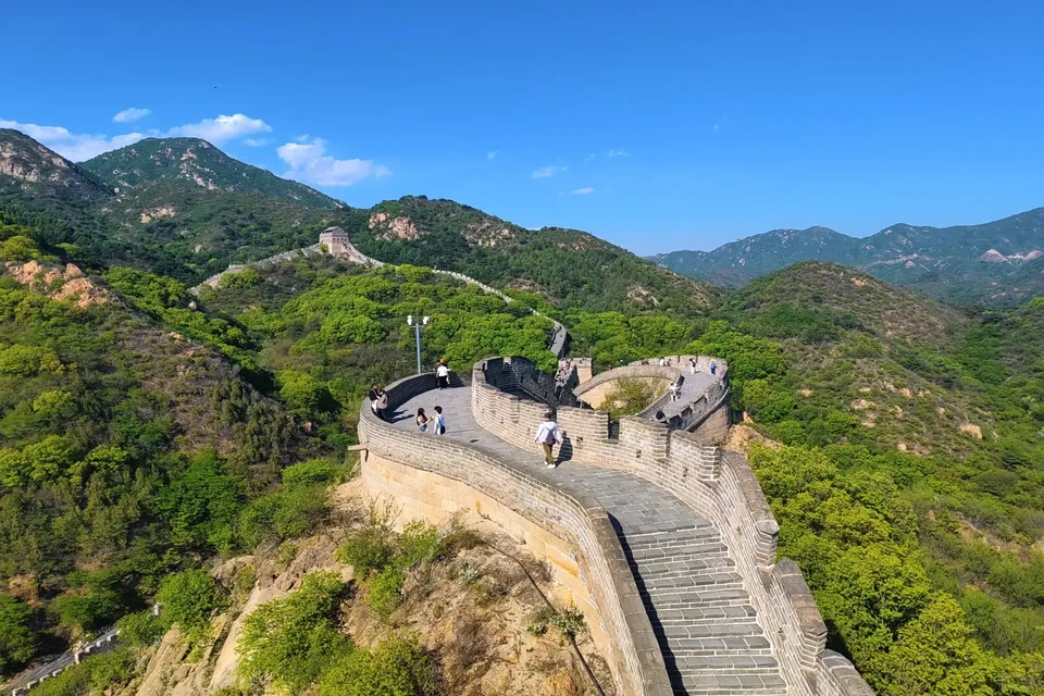 Badaling section of the Great Wall with winding stone ramparts and mountain views.