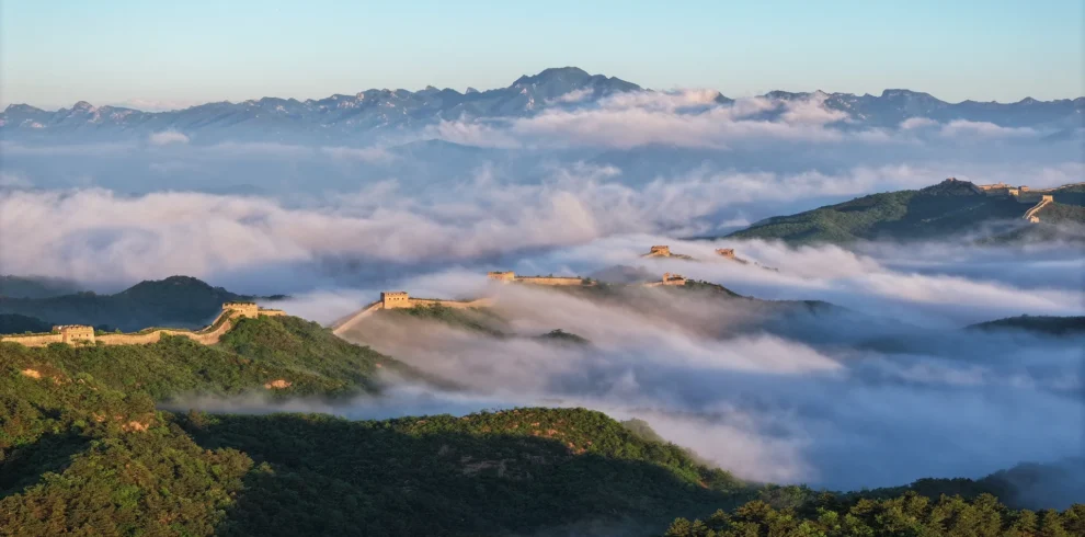 Iconic China travel scene featuring the Great Wall and classic city highlights from Beijing to Shanghai.