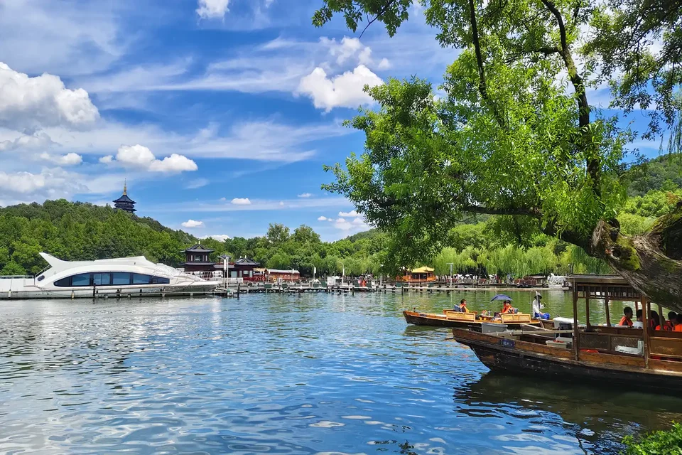 Scenic Hangzhou with West Lake and Longjing tea fields.