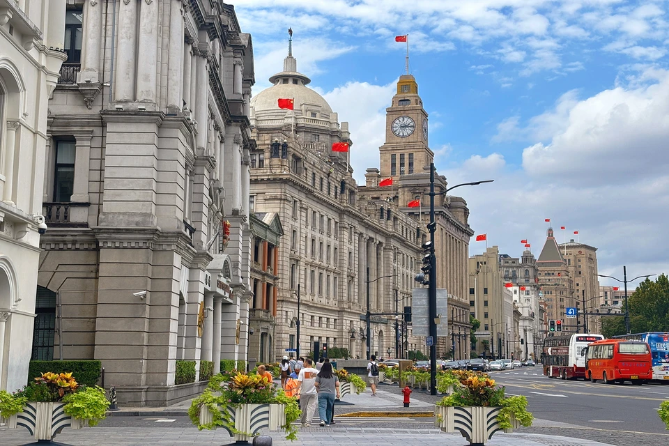 Shanghai cityscape blending historic waterfront views and modern urban energy.