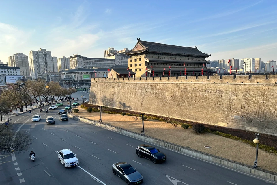 Xi’an cultural heritage with Terracotta Warriors and ancient city landmarks.